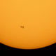 NELLYSFORD, VIRGINIA - JUNE 25: In this handout image provided by NASA, The International Space Station, with a crew of seven onboard, is seen in silhouette as it transits the Sun at roughly five miles per second.
